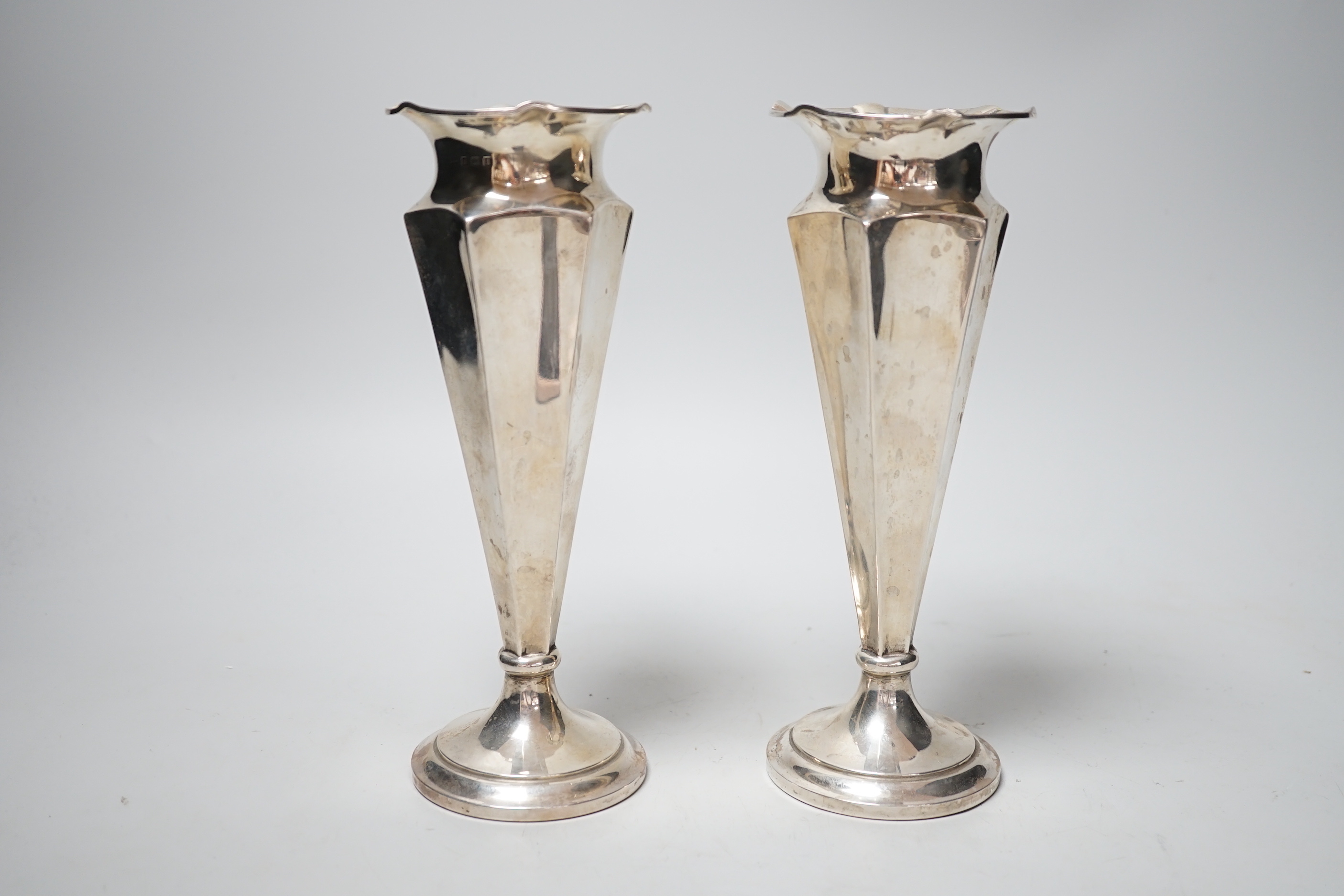 A pair of George V silver mounted spill vases, Deakin & Francis, Birmingham, 1910, height 20.4cm, weighted.